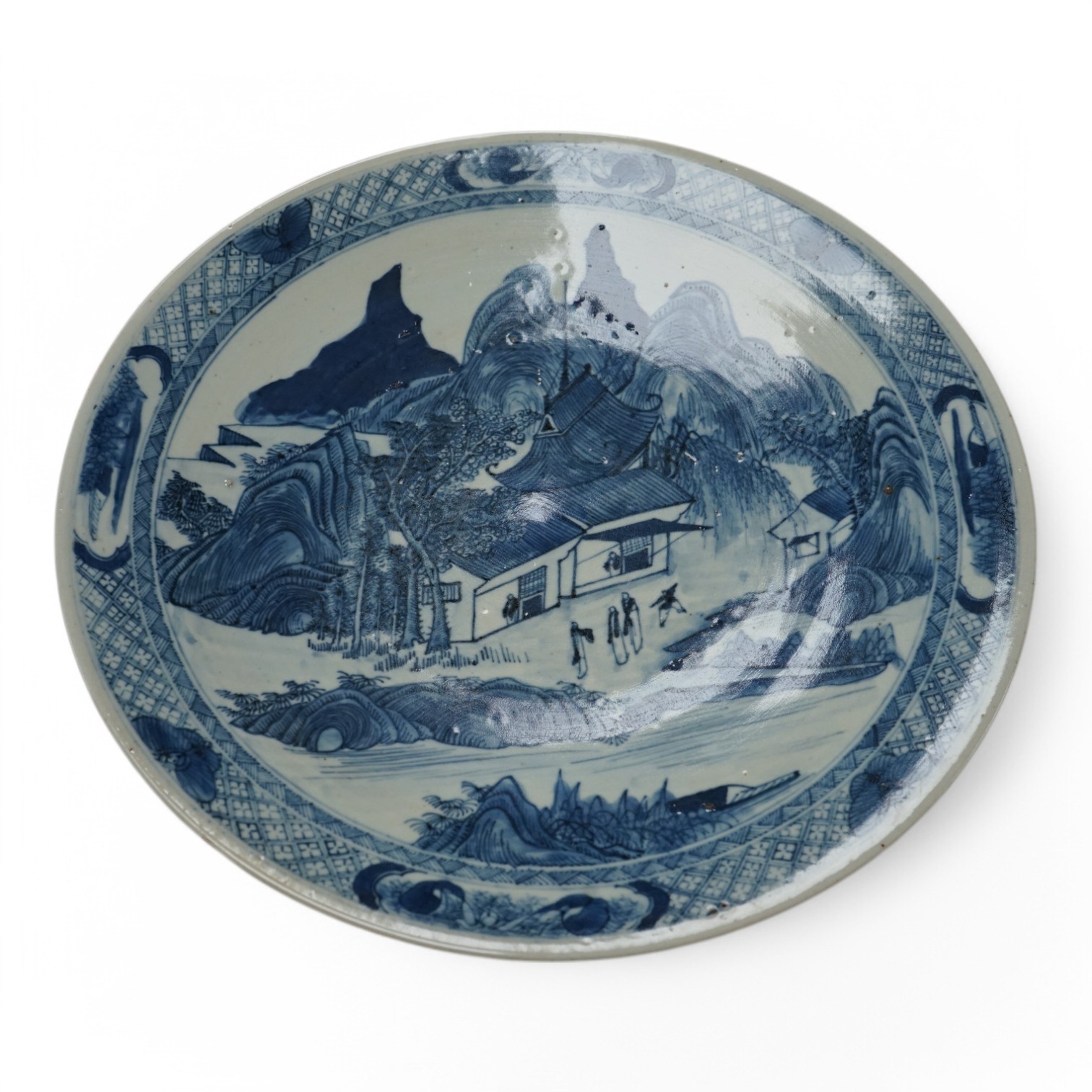 A 19th century Chinese blue and white dish, 37.5cm diameter. Condition - some glazing pitting in manufacture